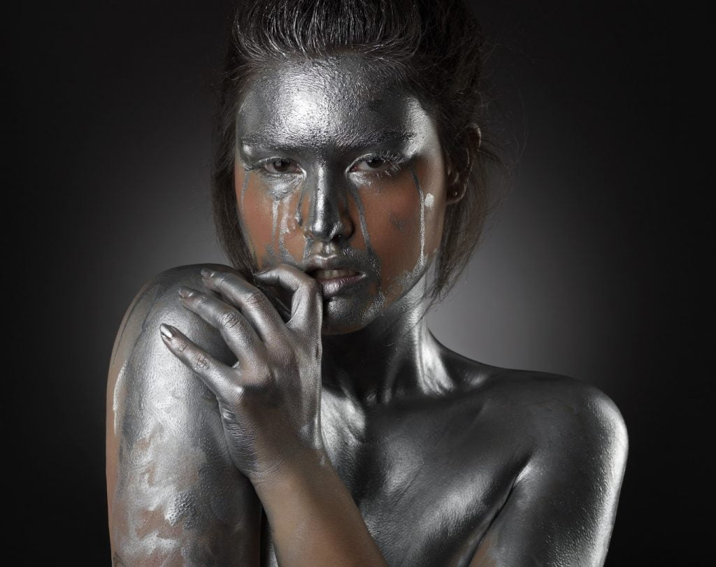 editorial body painting silver body paint