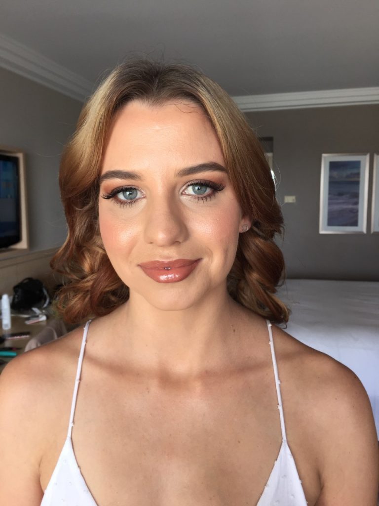 soft glam makeup and loose curls